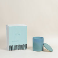 Ljuv sweet woody comfort candle in teal ceramic jar